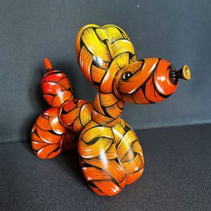 An Otto Schade AKA Osch unique artwork,  yellow and orange ribboned balloon dog